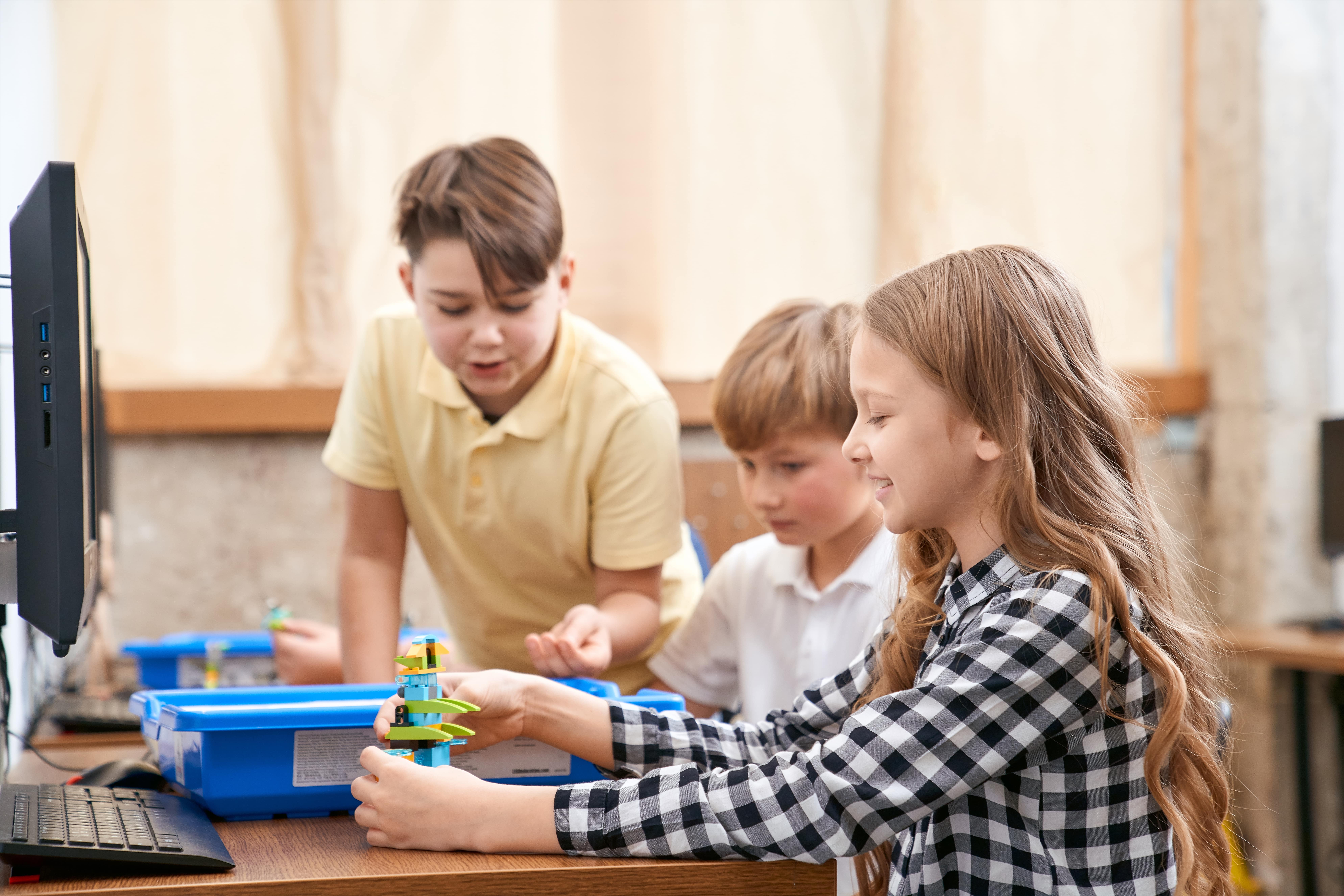 children using building kit